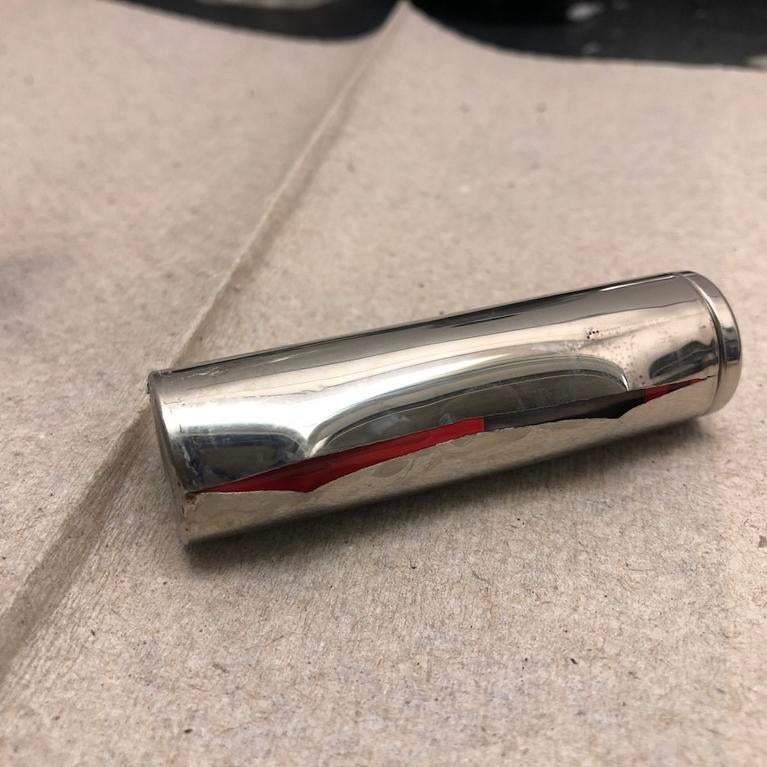 A Tesla car battery broken by industry standard fast charging